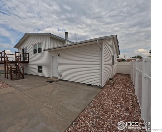 rear view of property with a patio area