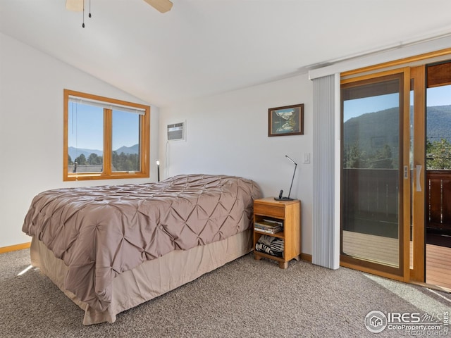 carpeted bedroom with lofted ceiling, access to exterior, ceiling fan, and a mountain view