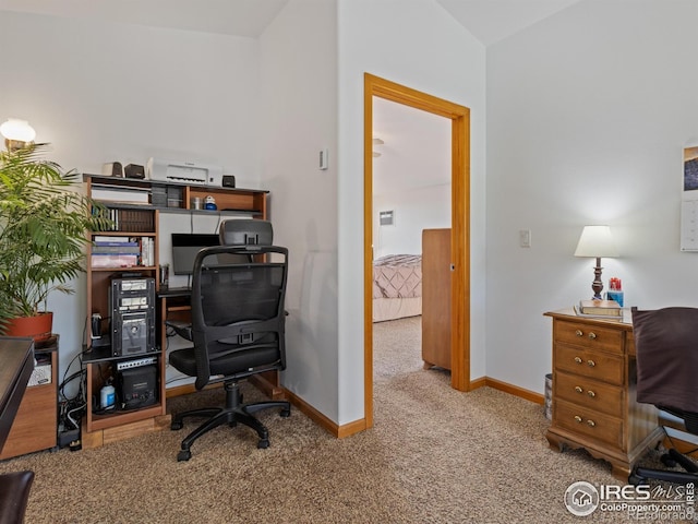 home office with carpet flooring and baseboards