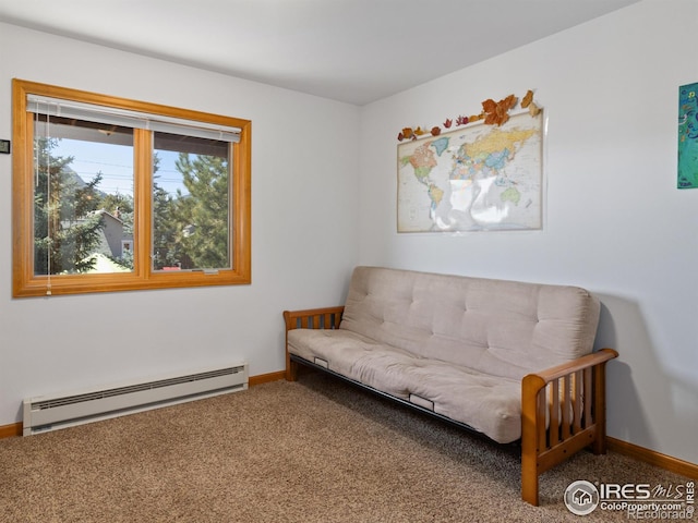 living area with a baseboard radiator, baseboards, and carpet flooring