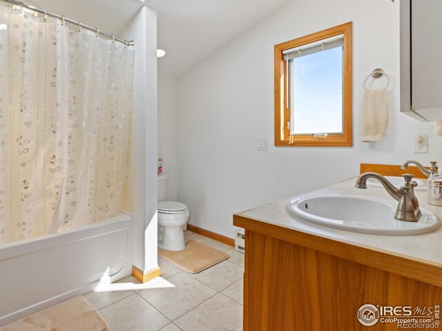 full bathroom featuring vanity, toilet, tile patterned floors, shower / bathtub combination with curtain, and baseboard heating