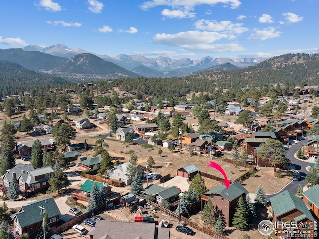 birds eye view of property featuring a residential view and a mountain view