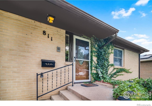 property entrance featuring covered porch