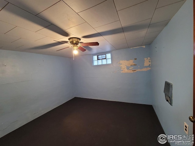 basement featuring ceiling fan