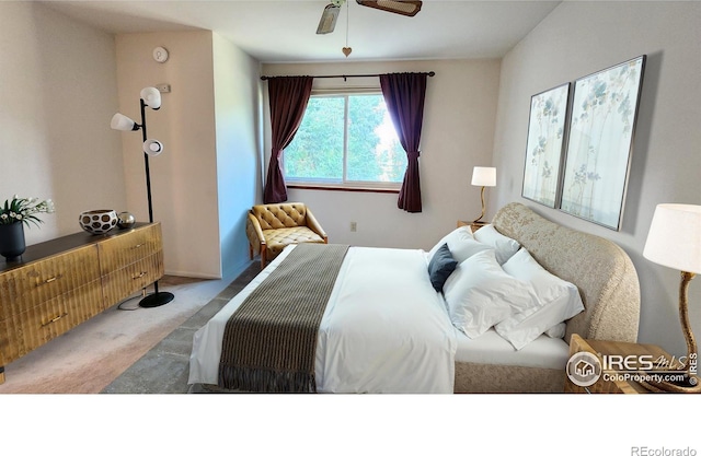 carpeted bedroom with ceiling fan