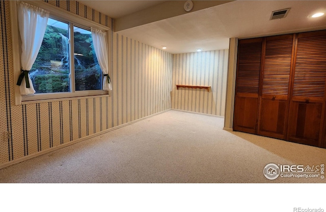 view of carpeted spare room