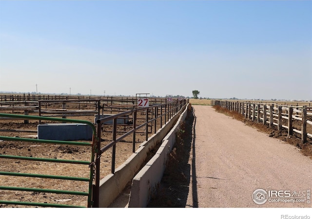 exterior space with a rural view