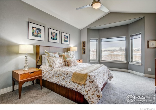 bedroom with lofted ceiling, carpet flooring, and ceiling fan