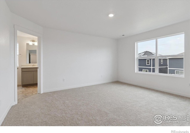 view of carpeted spare room