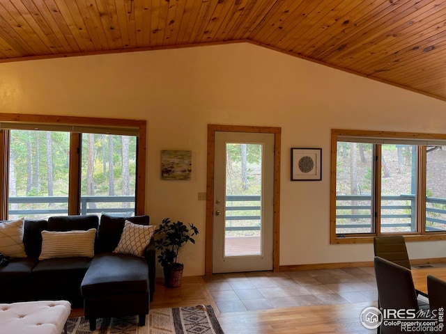 living room with wooden ceiling, a healthy amount of sunlight, vaulted ceiling, and light hardwood / wood-style flooring