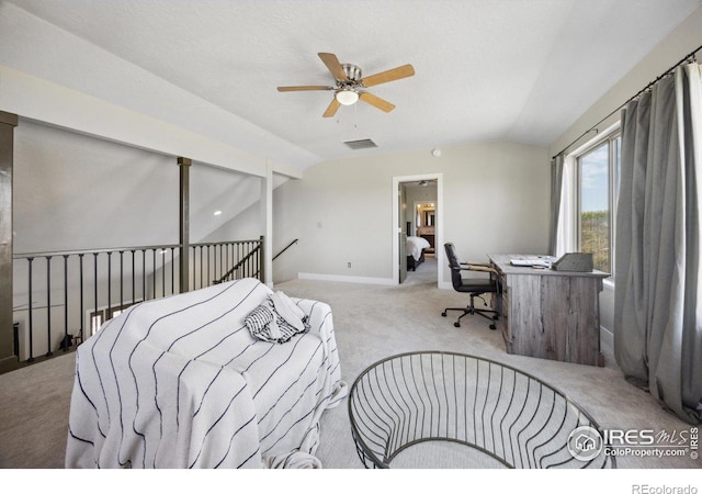 bedroom with lofted ceiling, ceiling fan, and carpet floors