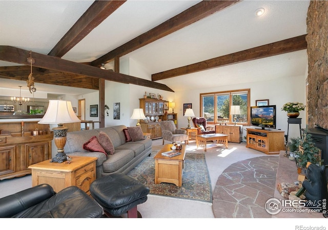 living room with a notable chandelier and beamed ceiling