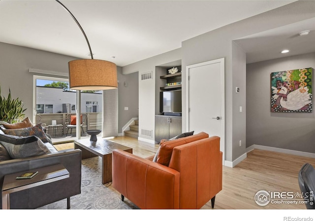 living room featuring light wood-type flooring