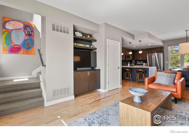 living room featuring light hardwood / wood-style floors