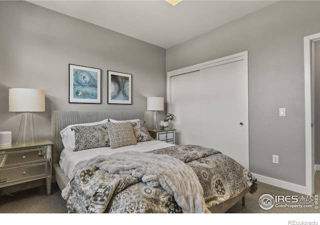 carpeted bedroom featuring a closet