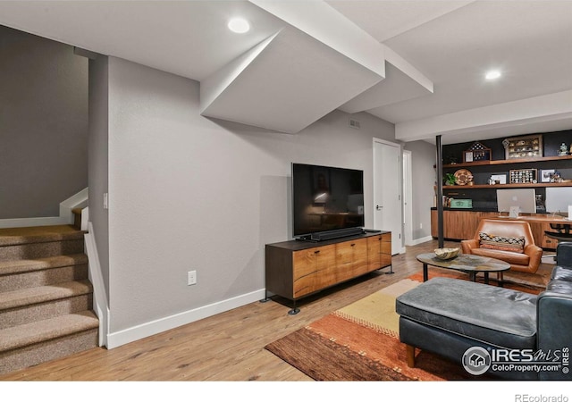 living room with light hardwood / wood-style floors