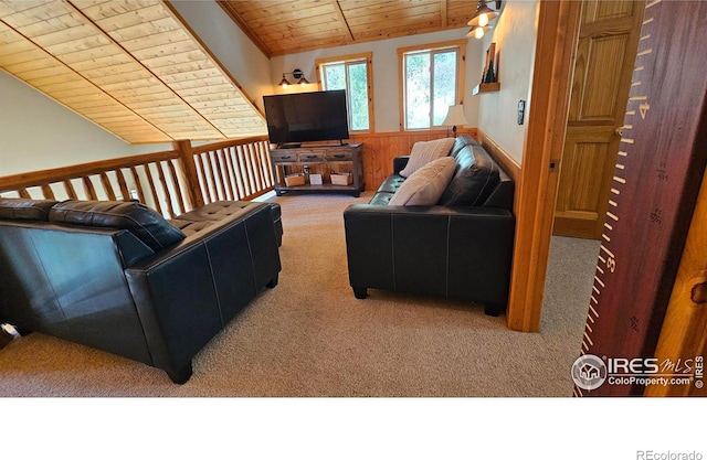 living room with carpet flooring, vaulted ceiling with beams, wooden walls, and wood ceiling