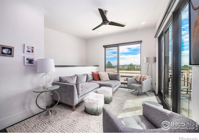 living room featuring ceiling fan