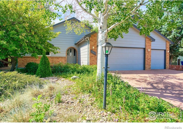 view of front of home featuring a garage