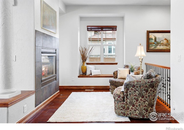 living area featuring dark hardwood / wood-style flooring