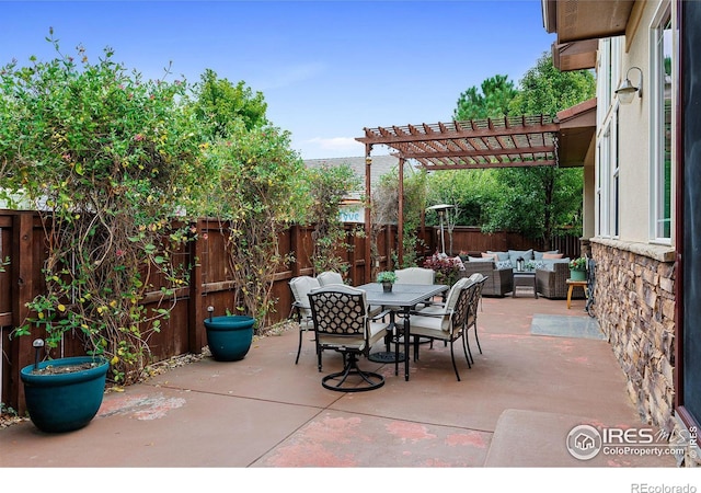 view of patio / terrace featuring a pergola and outdoor lounge area