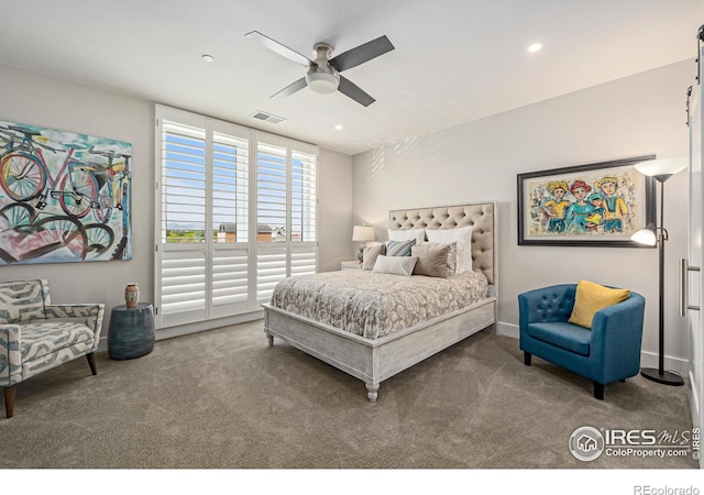 bedroom featuring ceiling fan and carpet floors