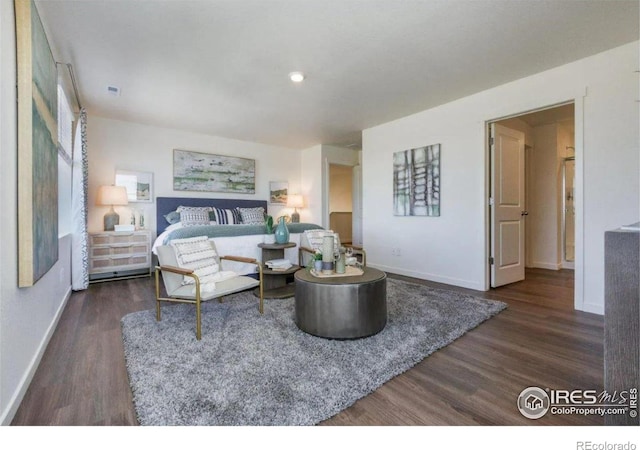 living room featuring dark hardwood / wood-style floors