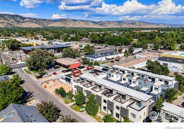 drone / aerial view featuring a mountain view