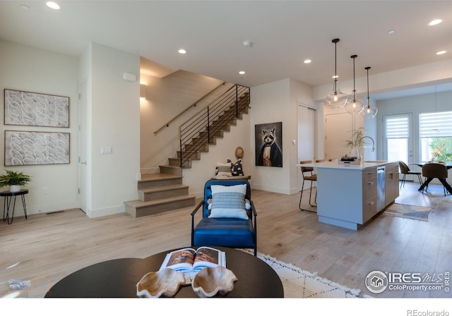 living room featuring light wood-type flooring