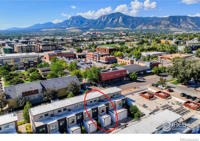 birds eye view of property featuring a mountain view