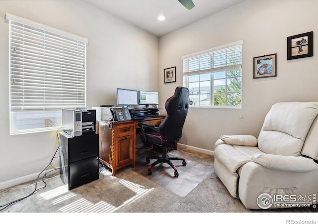 office area with light colored carpet