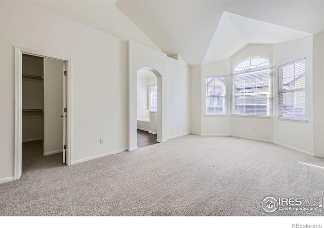 interior space featuring vaulted ceiling