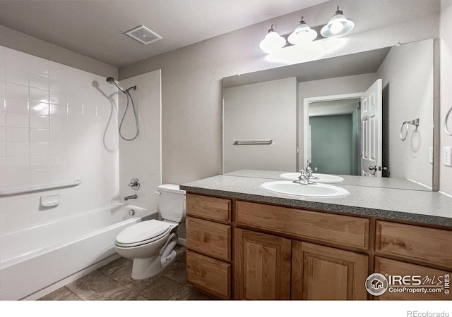 full bathroom featuring vanity, toilet, and shower / washtub combination