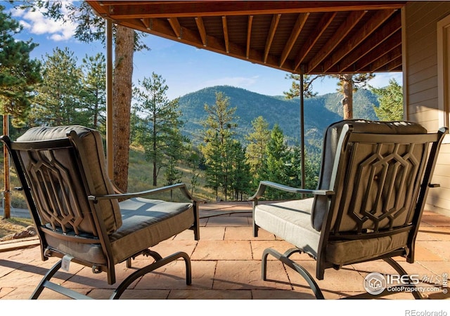 view of patio featuring a mountain view