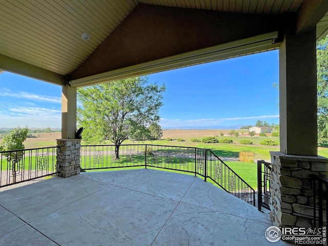 view of patio / terrace with a rural view