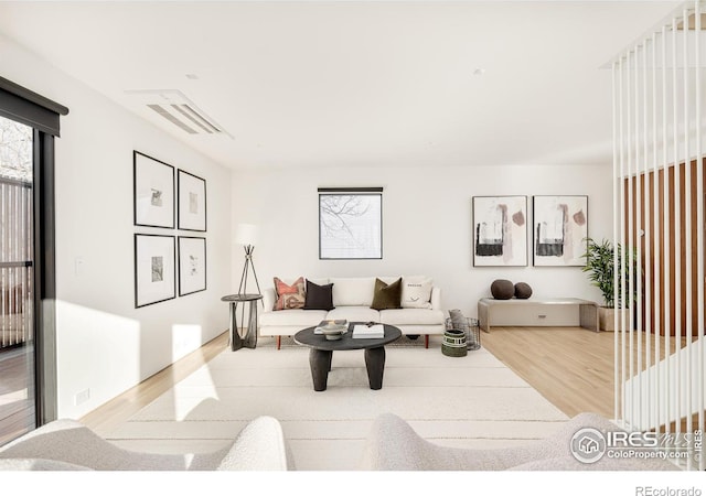 living room featuring light wood-type flooring