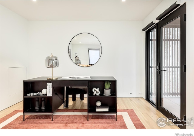 dining area with hardwood / wood-style floors