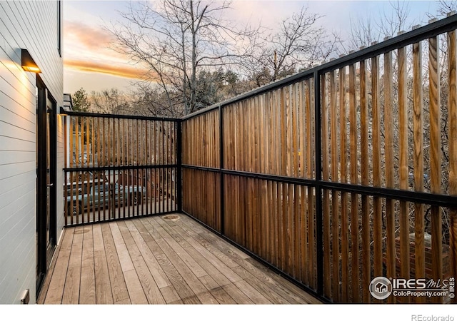 view of deck at dusk