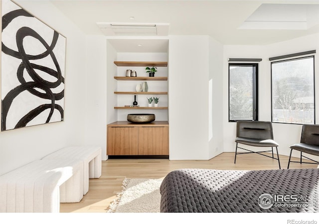 bedroom with light hardwood / wood-style flooring