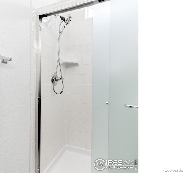 bathroom with an enclosed shower