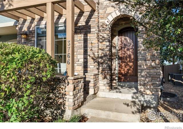 entrance to property with cooling unit