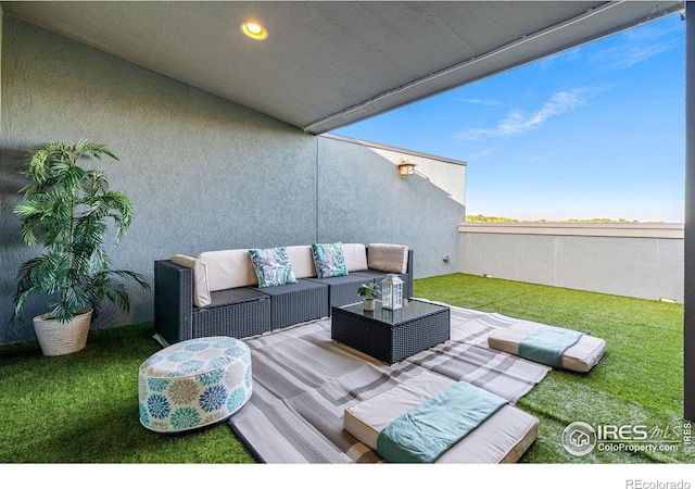 deck featuring a lawn, an outdoor living space, and a patio