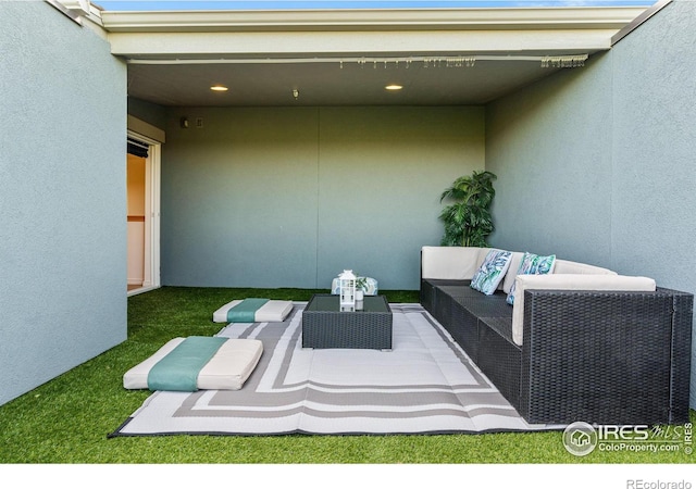 view of patio with an outdoor living space