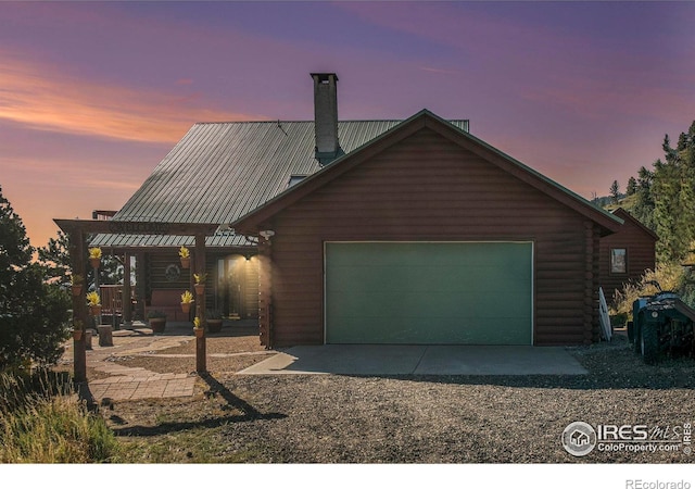 view of front of property featuring a garage