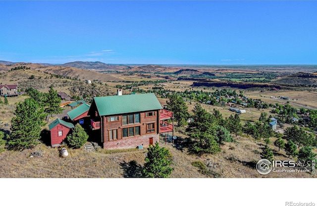 bird's eye view with a mountain view