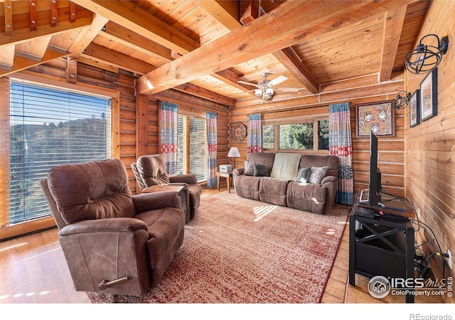 living room with ceiling fan, light hardwood / wood-style floors, wood ceiling, and beam ceiling