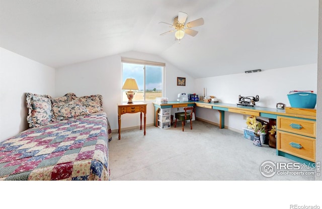 carpeted bedroom with lofted ceiling and ceiling fan