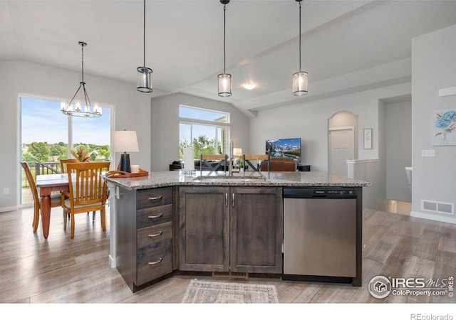 kitchen with visible vents, dark brown cabinets, dishwasher, light wood-style floors, and a sink