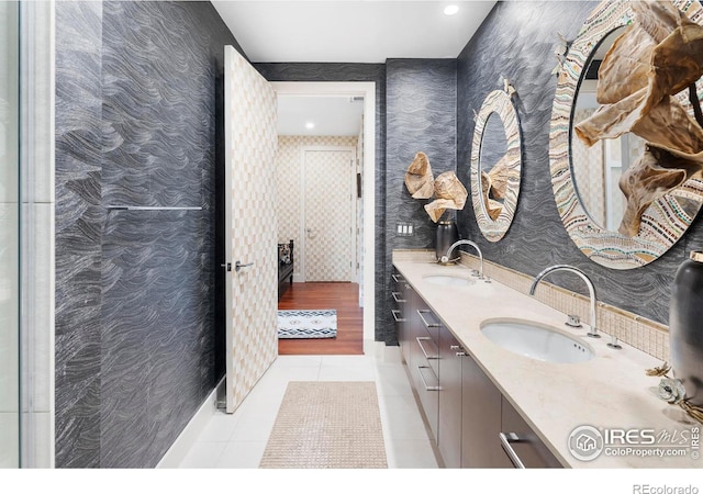 bathroom featuring tile patterned flooring and vanity