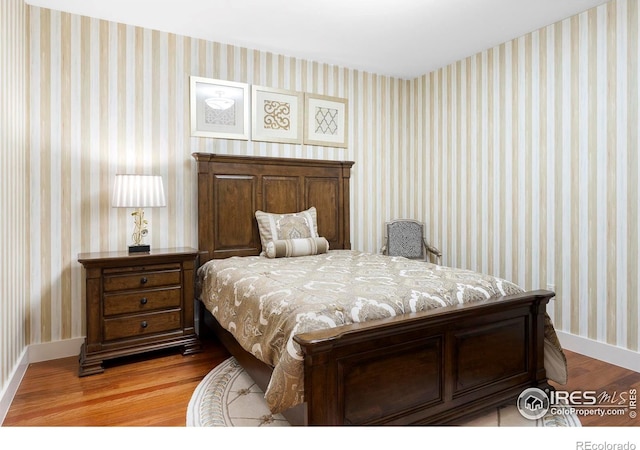 bedroom featuring light hardwood / wood-style flooring